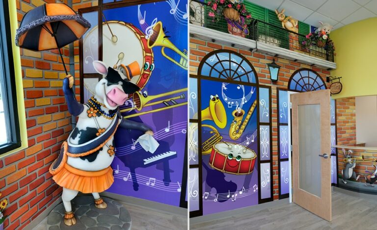 colorful music themed murals and partying cow photo op in office front entrance