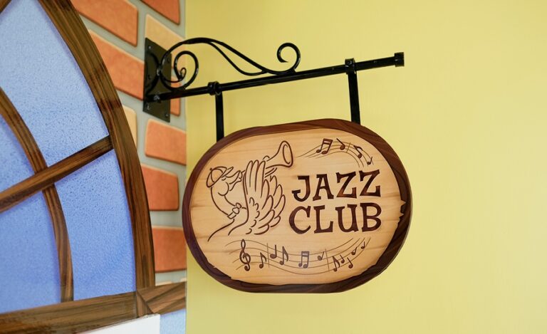 Custom faux wood "Jazz Club" signage for a musical mardi gras dental practice