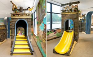 Custom kid's slide themed with pirate ship inspired cladding and characters