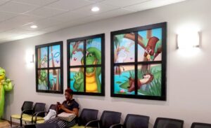 Faux windows decorated with custom vinyl murals of the everglades