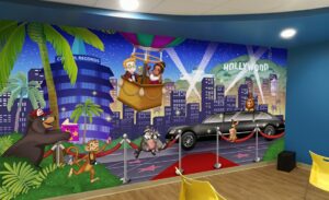 Office kids theater with Hollywood themed custom wall mural