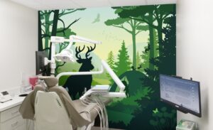 Woodland themed silhouette mural in dental treatment room for kids