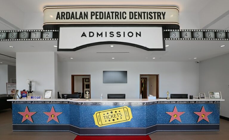 cinema themed reception desk at pediatric dentistry