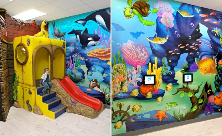 custom submarine slide and wall murals in an underwater themed play area for kids