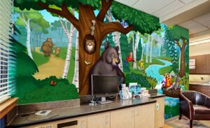 Kid-friendly woodland murals in pediatric dental office