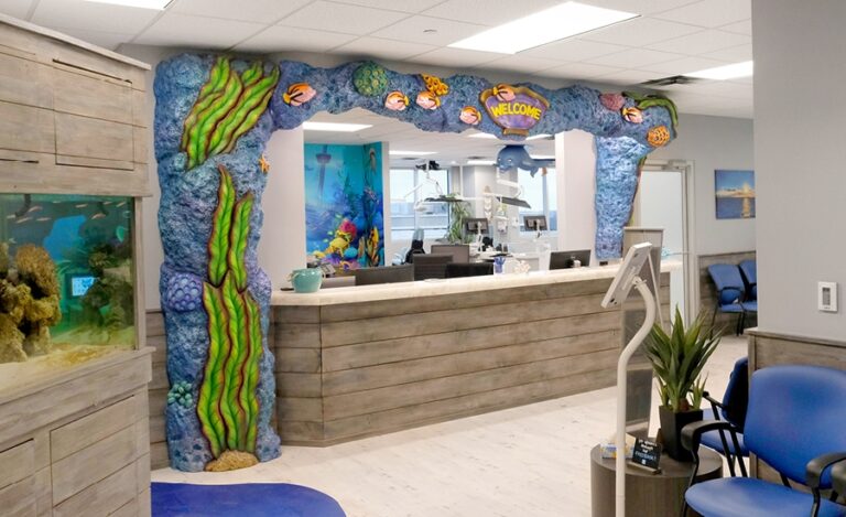 custom ocean themed reception desk in a pediatric dental office
