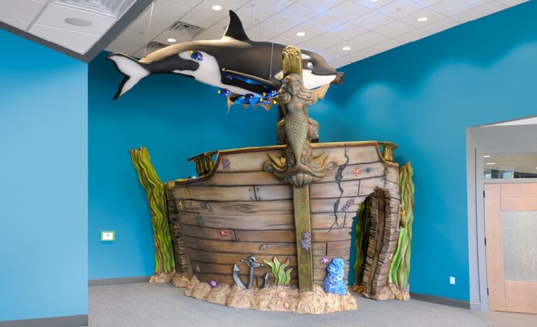 pediatric waiting room with ship wreck themed play area