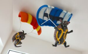 sculpted armadillos skydiving in kids play area