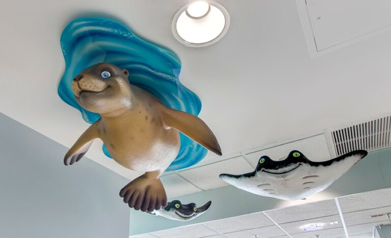 sculpted seal and ray characters in pediatric medical office