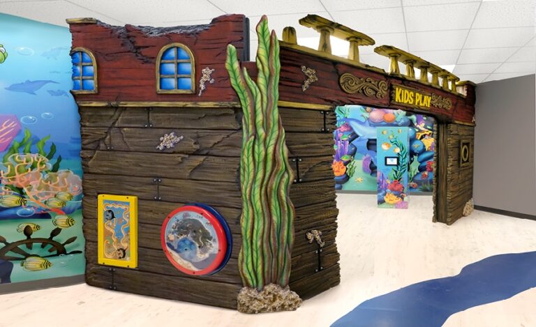 custom medical office shipwreck play area for kids with custom underwater murals and game units