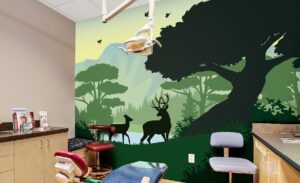 Woodland silhouette murals in dental treatment room