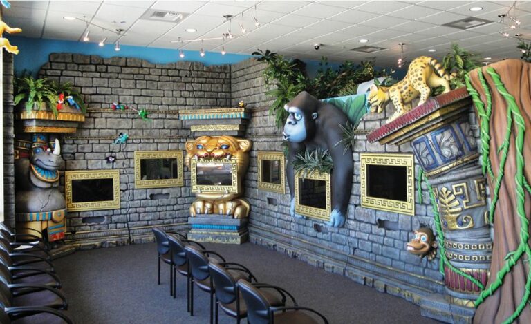 custom sculpted ancient jungle ruins gaming area for kids dental office