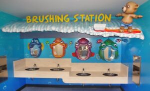 sculpted brushing station with custom fish brushing mirrors