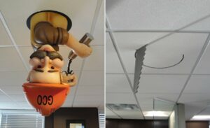 ceiling mounted characters popping out and sawing through ceiling tiles