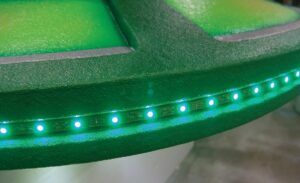 closeup of LED track lighting on an alien spaceship sculpture
