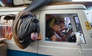 sculpted human couple with dog in van for trade show booth