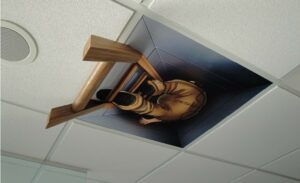custom 2d to 3d ceiling tile graphic of a construction worker climbing up a ladder
