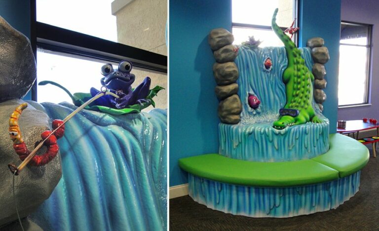 custom jungle themed bench seating with crocodile and waterfall sculpture