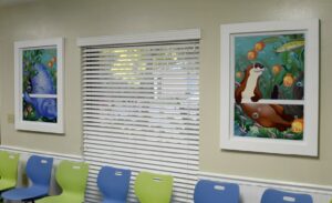 custom faux windows with cute underwater animals in a dentistry waiting room