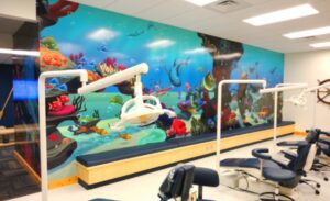 custom murals in kids treatment room