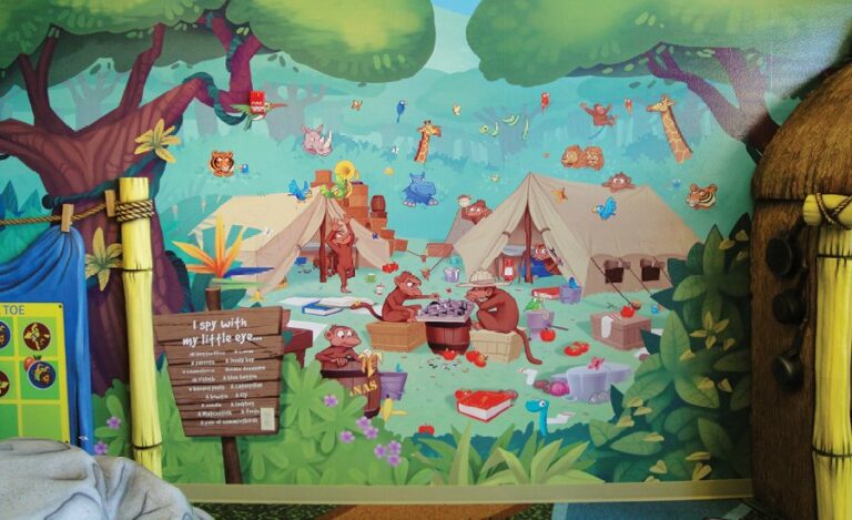 custom pediatric mural of a jungle monkey camp with custom i spy games mural