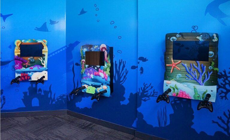 custom underwater themed gaming units in pediatric dental office