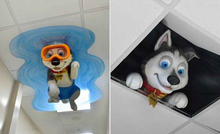cute dog mascot swimming and poking out of ceiling tiles