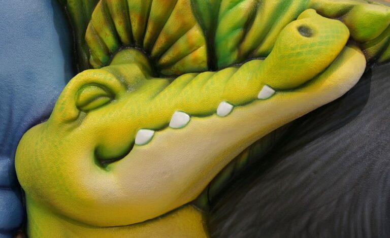 detail of sculpted crocodile head for a pediatric clinic reception desk