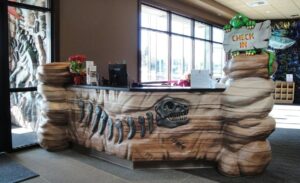 dinosaur fossil themed reception check in desk