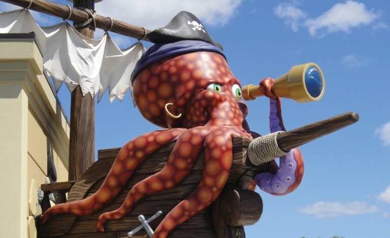 giant pirate octopus sculpture with a telescope outside of pediatric office