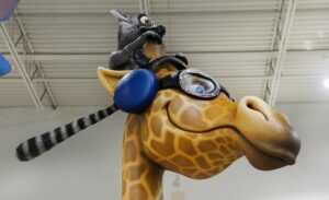 giraffe and lemur sculpture