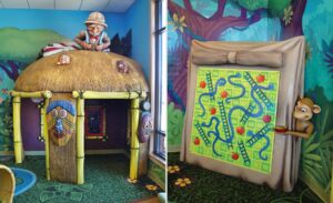 jungle hut play area with build in wall games