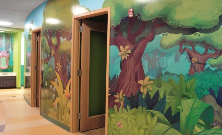 jungle murals in hallway of a kids dental office
