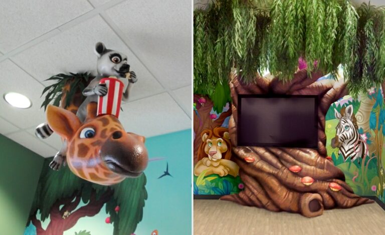 jungle themed theater with beautiful tree sculpture and murals for kids dentist office