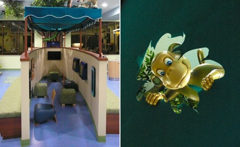 kids play area with wall mounted activities and a peeking monkey in a boat themed waiting room