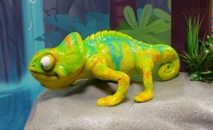 multicolored sculpted chameleon in a dental office