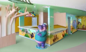 pediatric hospital check in with hippo sculpture and murals