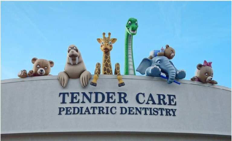 rooftop sculptures of walrus giraffe dinosaur elephant and bear characters for a pediatric dental office