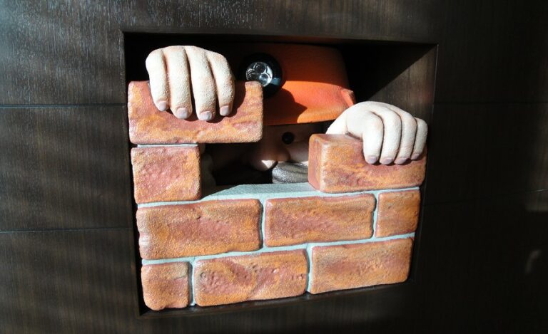 sculpted bricklayer in a humorous construction themed orthodontics clinic