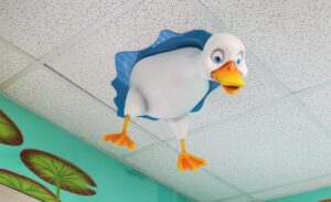 Sculpted duck character in ceiling for pediatric treatment area