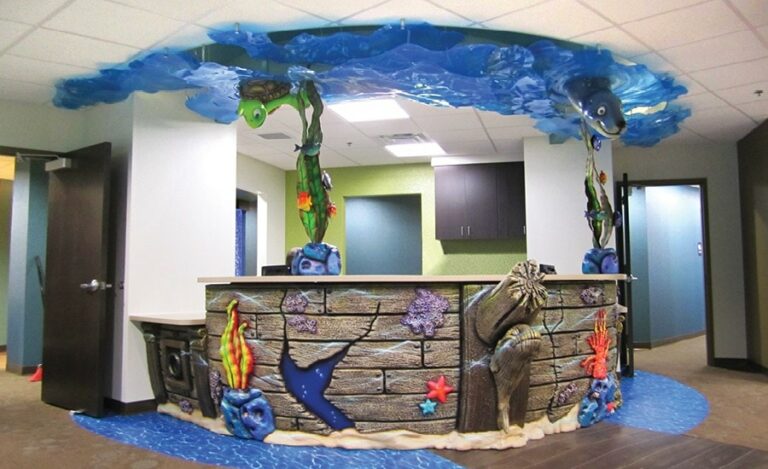 sunken ship themed reception desk in a pediatric dental office