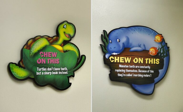 turtle and manatee themed dental fact signs in a pediatric practice