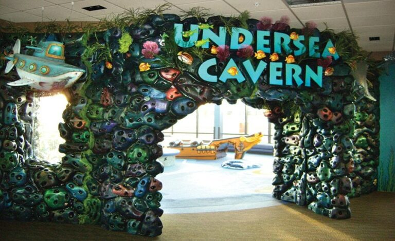 undersea cavern entrance to kids play area in pediatric dental office