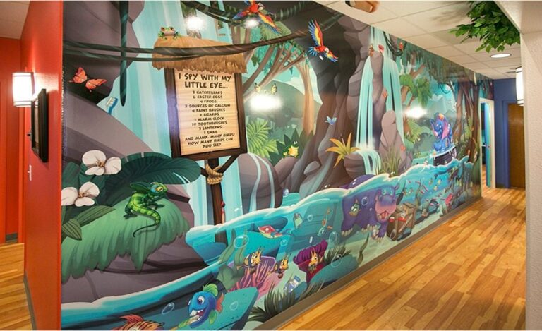 vibrant illustrated wall mural with jungle waterfalls and river animals with an i spy game for a kids dentistry