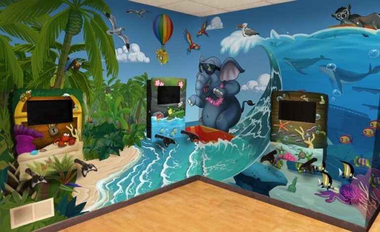 wall mounted gaming stations with tropical beach designs in a pediatric clinic