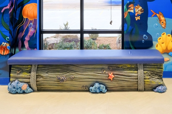 Cladded underwater themed bench.