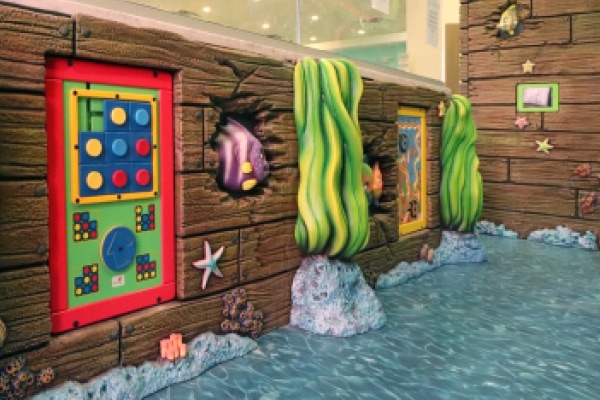 Interactive games in pirate ship themed play area