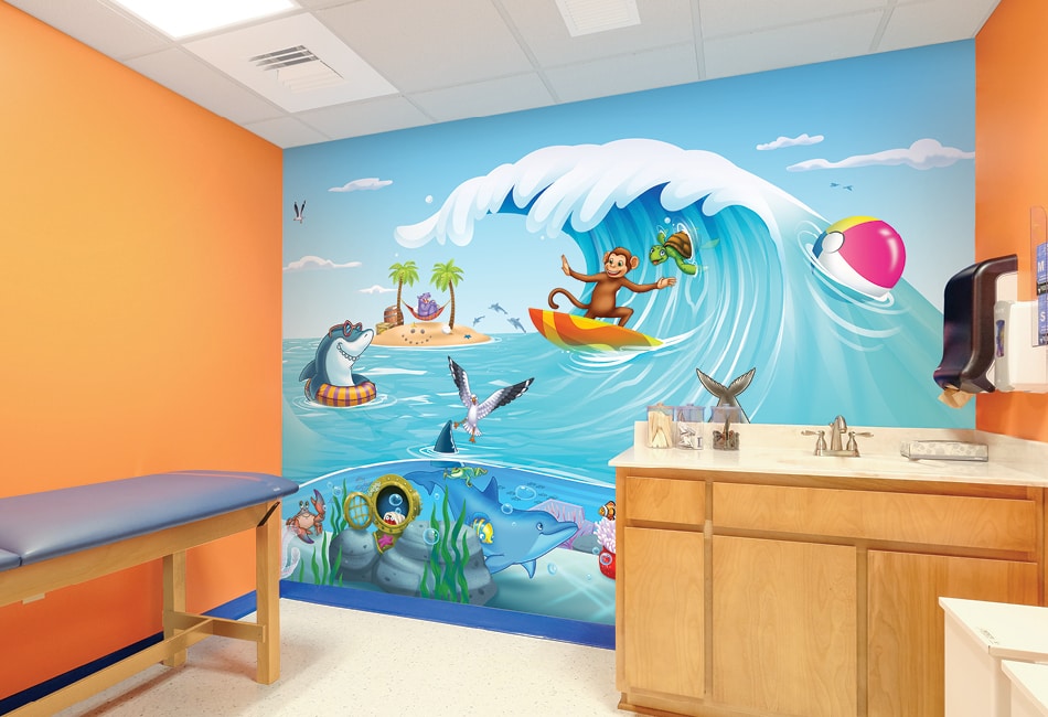 Treatment room with a kid friendly beach themed wall mural and orange accent walls.