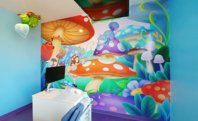 Alice in Wonderland themed dentist treatment room.