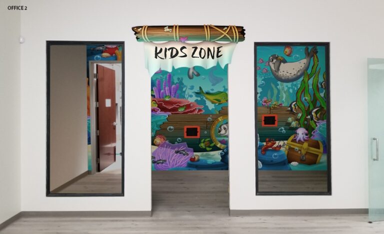 Kids zone with kid friendly underwater themed mural with wall mounted gaming systems.